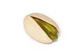 One Unpeeled pistachio nut on white background Royalty Free Stock Photo