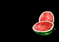 One watermelon cuted in halves on black background Royalty Free Stock Photo