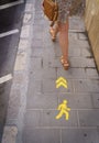 One-way pedestrian sign on the floor to maximize the social distance and preventively prevent contagion by covid-19