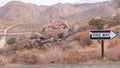 One way road sign arrow, highway roadside in California, USA road trip in desert Royalty Free Stock Photo