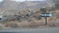 One way road sign arrow, highway roadside in California, USA road trip in desert Royalty Free Stock Photo