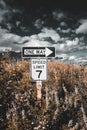 One Way road sign and speed limit 7 sign Royalty Free Stock Photo
