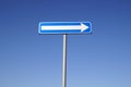 One way sign against a blue sky background Royalty Free Stock Photo