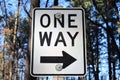 One Way Sign With Arrow And Black Border In Forest Royalty Free Stock Photo
