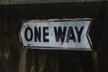 ONE WAY sign on concrete wall Royalty Free Stock Photo