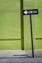 One Way Sign & Green Wall Royalty Free Stock Photo