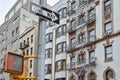 One way sign and old apartment facades, with fire stairs. Soho, Manhattan. NYC Royalty Free Stock Photo