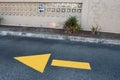 One-Way Sign and One-Way Yellow Ground-Arrow Pointing the Way Royalty Free Stock Photo