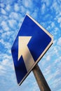 One way sign under blue sky Royalty Free Stock Photo