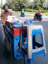 one way to sell traditional coffee, ice, drinks using a cart in Indonesia