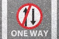 one way traffic movement sign painted onl road . Royalty Free Stock Photo