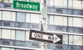 One Way traffic sign at Broadway road, color toning applied, selective focus, New York City, USA