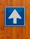 One way traffic sign on wooden wall Royalty Free Stock Photo