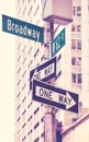 One Way traffic signs at Broadway road, color toning applied, selective focus, New York City, USA