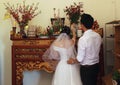 Grandfather with bride and groom are burned incense to forefather in wedding day Royalty Free Stock Photo