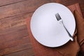 One white clean plate with fork Royalty Free Stock Photo