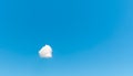 One white cloud against a blue sky Royalty Free Stock Photo