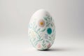 One white easter egg with beautiful floral pattern standing on light background. Generative AI Royalty Free Stock Photo