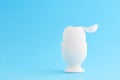 One white egg in egg cup with with an open top ready for eating Royalty Free Stock Photo