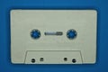 One white gray old plastic audiotape