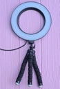 one white large round lamp selfie ring on a black tripod Royalty Free Stock Photo