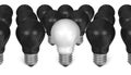 One white light bulb among many black ones Royalty Free Stock Photo