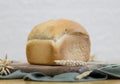 One white round bread with wheat fiber on the table. Royalty Free Stock Photo