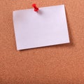 One white sticky post note pinned cork bulletin board copy space Royalty Free Stock Photo