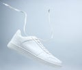 One white unisex sneaker