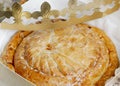 One whole fresh royal galette with a crown in a box.