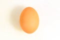 One whole raw egg on a white background Royalty Free Stock Photo