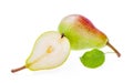 One whole red green pear with leaf, isolated on white, and half Royalty Free Stock Photo