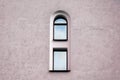 One window and gray wall of an old vintage building Royalty Free Stock Photo