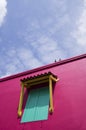 One window on a pink wall. Royalty Free Stock Photo