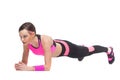 One woman exercising workout fitness aerobic exercise on studio isolated white background. Perfect plank. Royalty Free Stock Photo