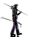 One woman skier walking silhouette