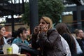 One woman talking in the smartphone during lunch break