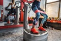 One woman training on the power plate machine female use powerplate for exercise legs and low section Royalty Free Stock Photo
