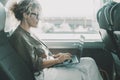 One woman working on bus with laptop during passenger travel. Businesswoman modern lifestyle people digital nomad. Smart working