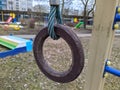 one wooden gymnastic ring on the playground