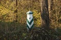 one wooden landmark stand in green grass Royalty Free Stock Photo