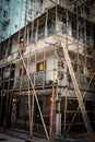 One worker building a bamboo scaffolding in hong kong, china