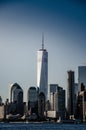 The One World Trade center or Freedom Tower located in New York City. Architectural modern buildings at lower Manhattan skyline. Royalty Free Stock Photo