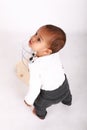 Curious toddler boy playing with Montessori toy for toddlers