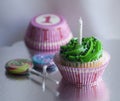 One-year hapy birthday cupcake and lollipops Royalty Free Stock Photo