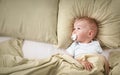 One year old baby in the bed Royalty Free Stock Photo