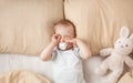 One year old baby in the bed Royalty Free Stock Photo