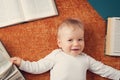 One year old baby with spectackles and books Royalty Free Stock Photo