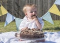 One year old baby boy chocolate cake smash Royalty Free Stock Photo