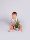 One year old baby with Christmas tree Royalty Free Stock Photo
